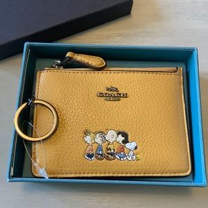COACH PEANUTS cardholder / key ring. Yellow zipper card holder. Brand new in box
